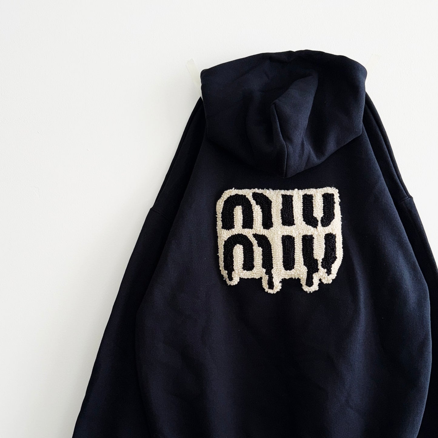 IMT hand knitted patch hoodie dripping MIUMIU