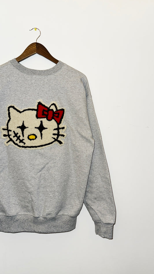 IMT hand knitted patch crewneck hello KT