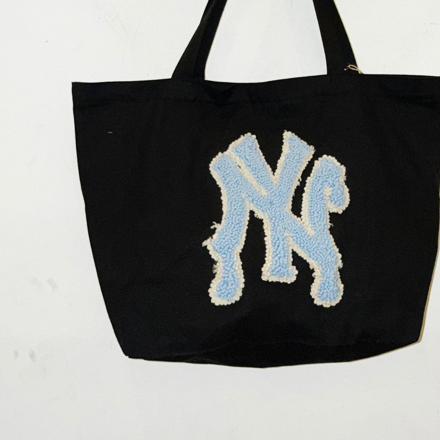 IMT hand knitted patch tote black NY