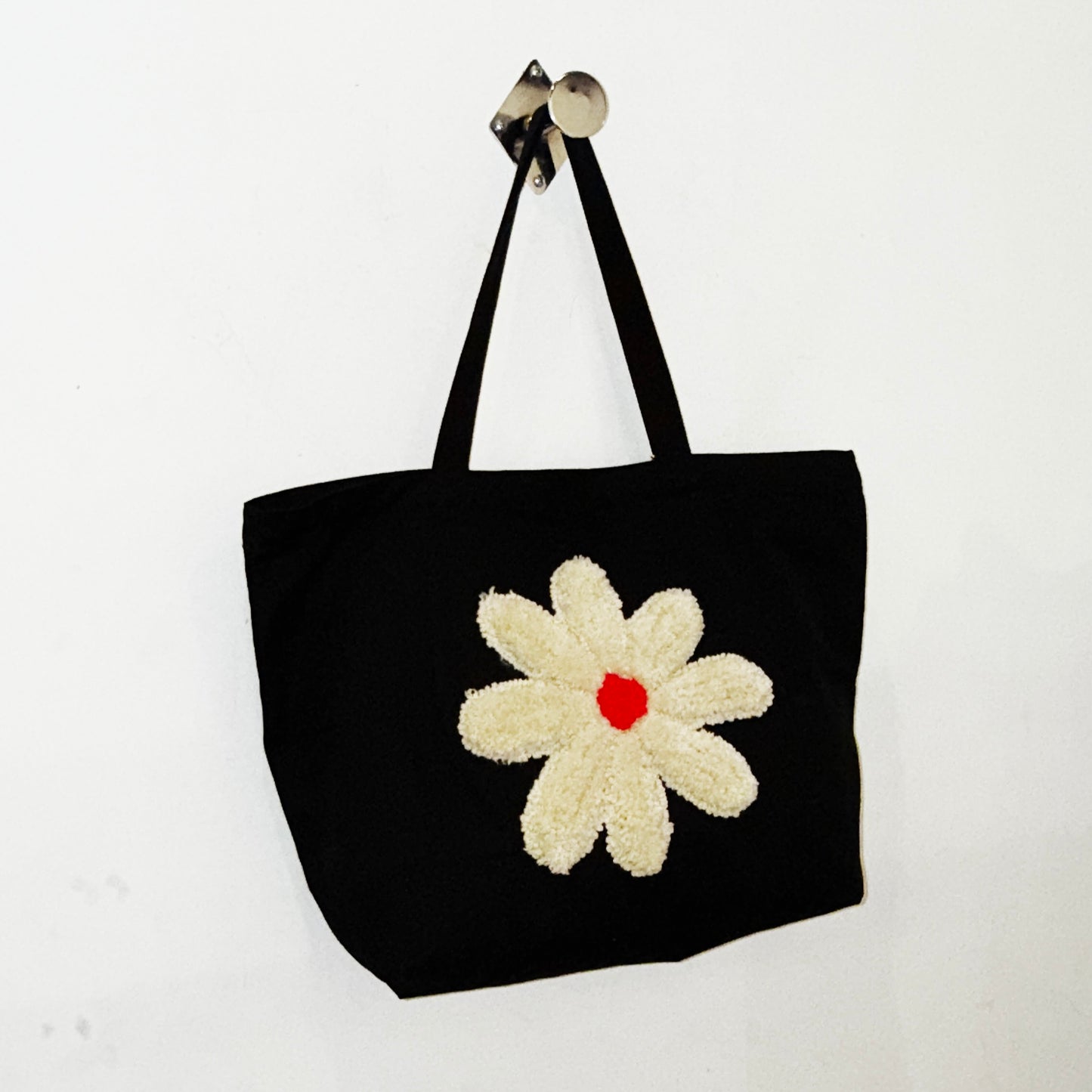 IMT hand knitted patch tote black daisy